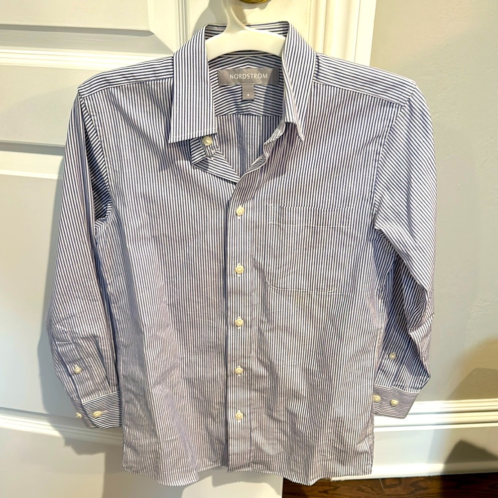 Like new, white and blue pinstripe button down boys shirt. Worn once.